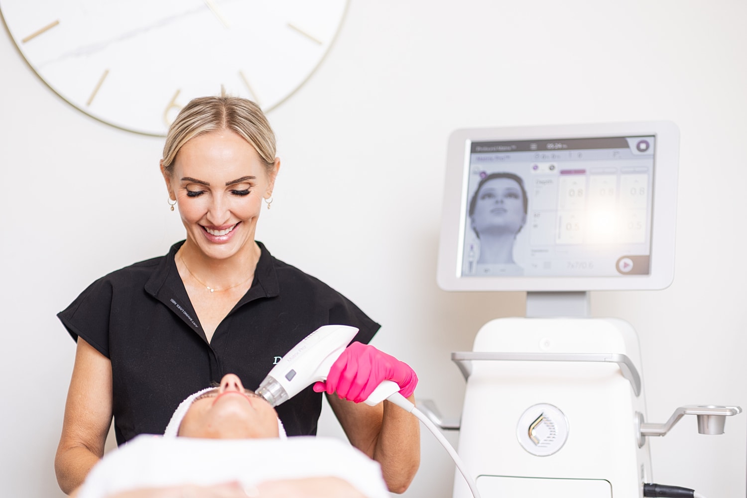 Portrait of a woman with long dark hair.