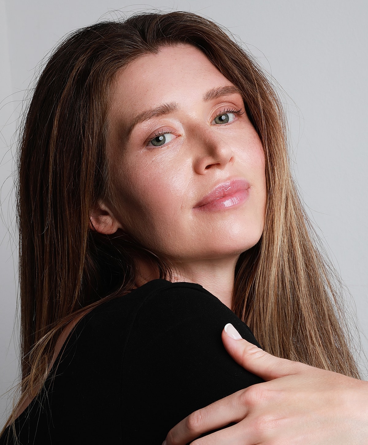 Portrait of a woman with long hair.