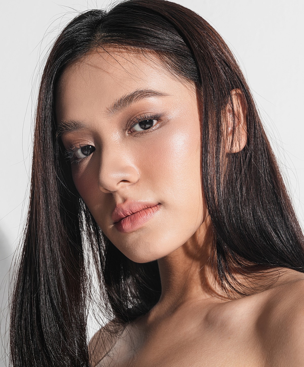 Close-up of woman's face with long hair.