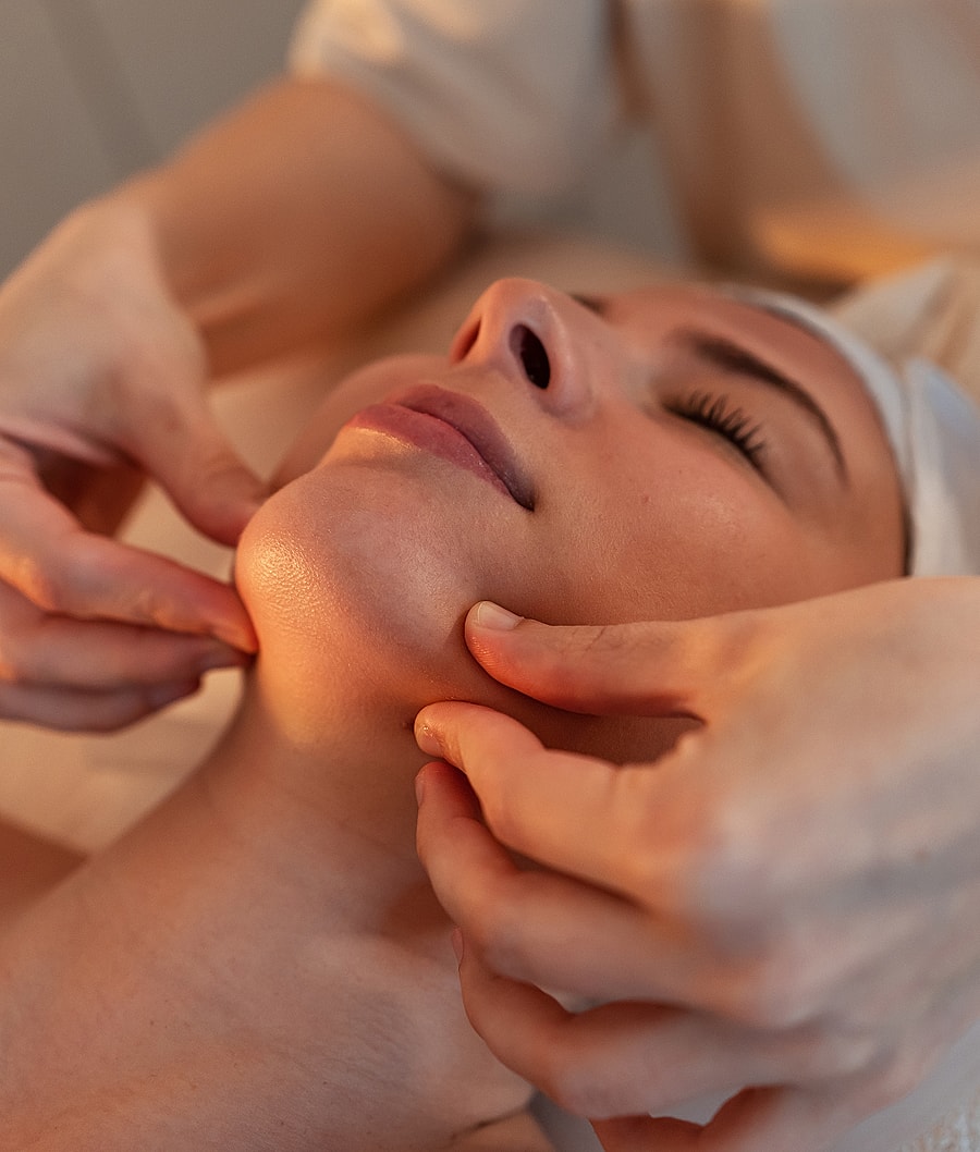 Facial massage during a skincare treatment session.