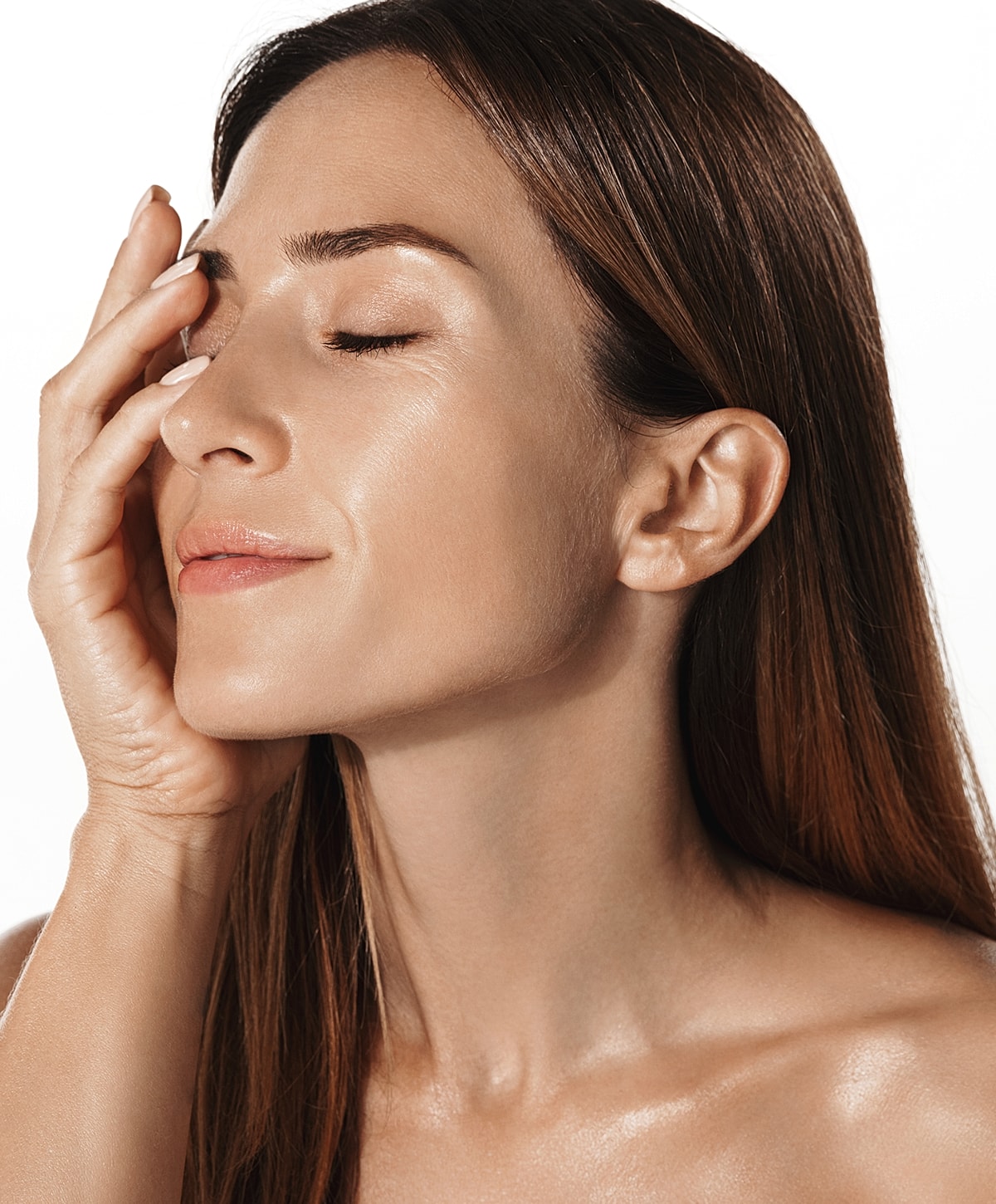 Woman with long hair, eyes closed, serene expression.